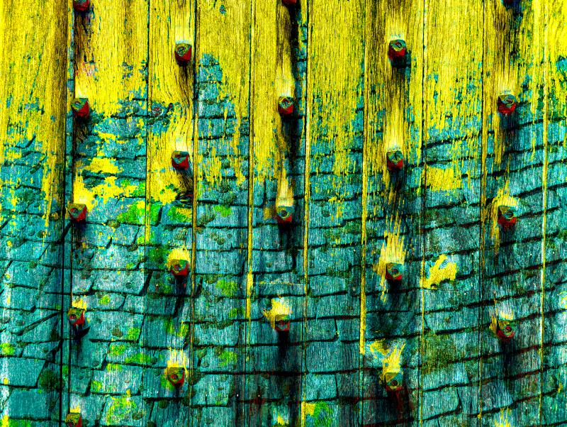 Wooden door bolts and lichen-spotted stone tiles reimagined in vivid yellow and teal tones.