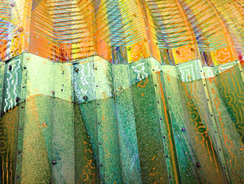 Utilitarian structure turned into a vivid study of pattern, color, and the architecture of repetition